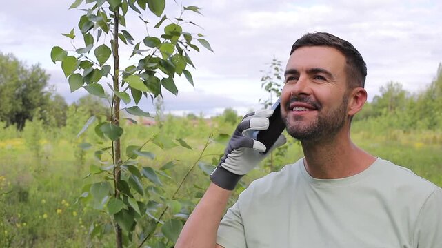 Forestry Inspector Making A Phone Call