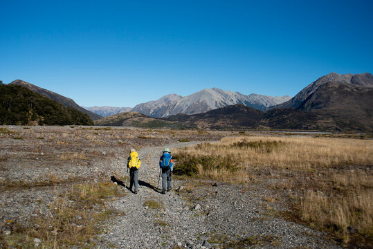 Brother and sister tramping Arthur's Pass National Park, New Zealand.