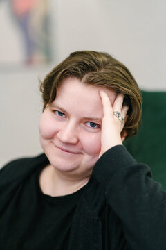 Portrait of a smiling young woman.