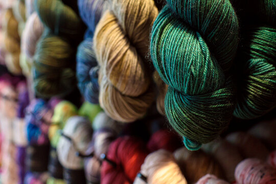 Close-up detail of green wool skein.