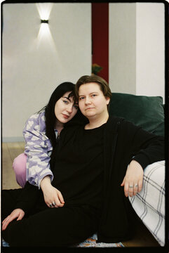 A couple sitting together in a room.