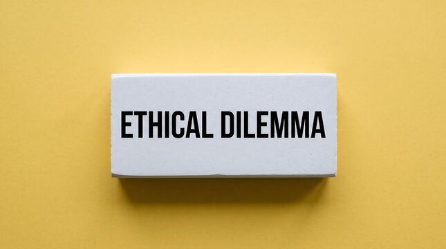 Ethical dilemma text on white wooden block, business ethics and moral choice concept, decision making metaphor on yellow background