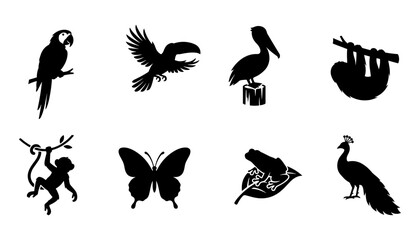 Obraz premium Animals Including a Parrot, Toucan, Pelican, Sloth, Monkey, Butterfly, Hummingbird, and Peacock in Silhouette
