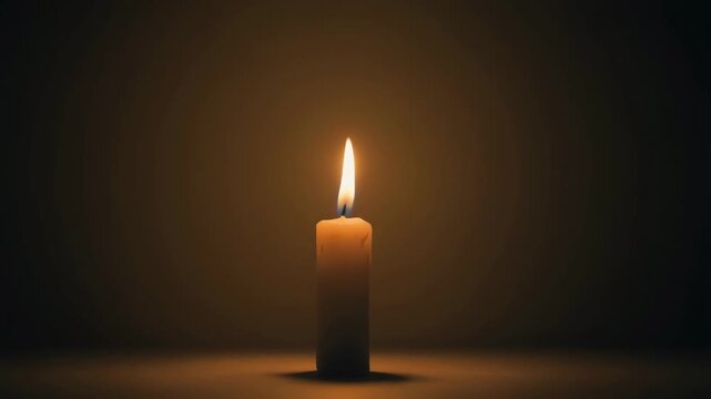 A lone candle flame flickers softly in the dark, casting a warm golden glow across the shadows with a smooth, cinematic texture