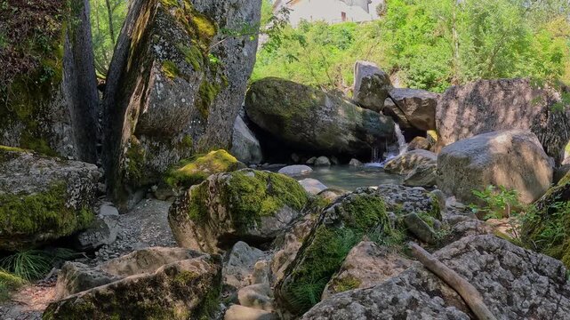 Broken stone with waterfall on Fumaiolo mount, Central Italy