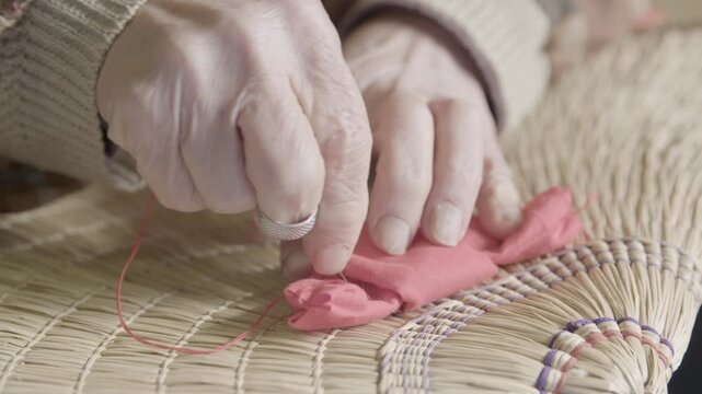 Hands Sewing Red Cloth for Bon Odori Hat Making in Ugo Town Akita Japa