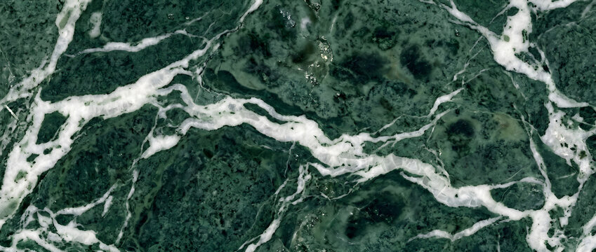 Marble displays a sophisticated deep green stone surface with flowing white mineral veins and polished texture for premium creative backgrounds