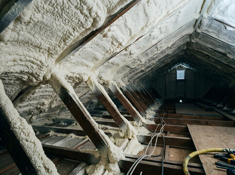 Spray Foam Insulation in Attic | Energy Efficient Home Renovation | Polyurethane Foam on Rafters | Thermal Barrier | Residential Construction Detail | Attic Sealing | Building Renovation | Maintenance