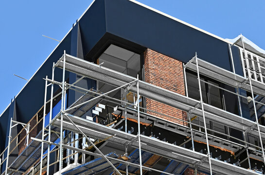 Trade building construction site with scaffolding