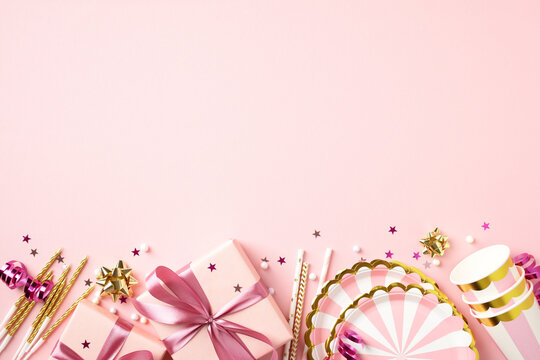 Pink birthday party bottom border with gifts and tableware.