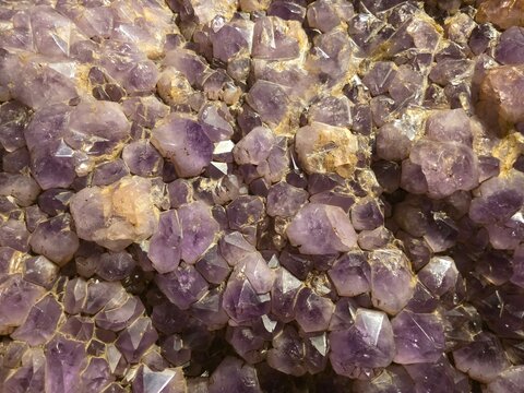Close up shot of a raw amethyst crystal