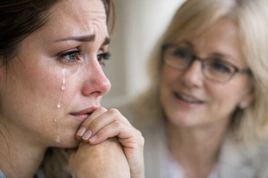 Two women sharing an emotional moment