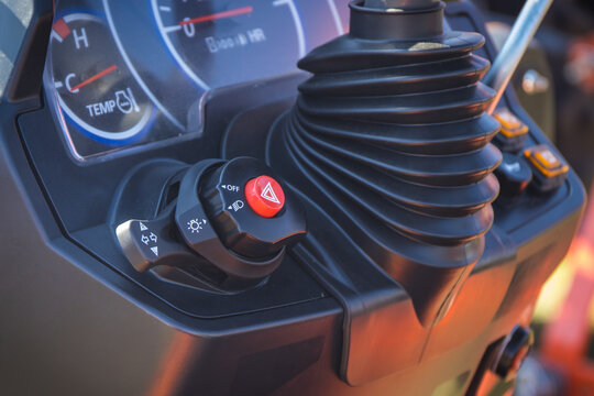 Operating control panel with buttons in tractor, truck or agricultural machine
