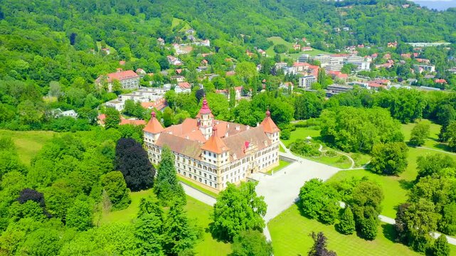 Graz, Austria. Eggenberg Palace (Schloss Eggenberg) - the largest aristocratic residence in Styria is listed as a World Heritage Site. Construction was completed by 1646. Drone footage, Point of inte