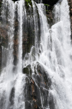 Waterfall close‑up: powerful streams in vertical frame