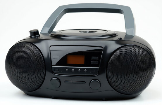 Portable black boombox features CD player and radio. This retro audio device has speakers and handle. Plays MP3 files for music enjoyment. Old school tech.