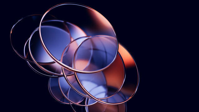 Interlocking glass rings with glossy copper reflections.