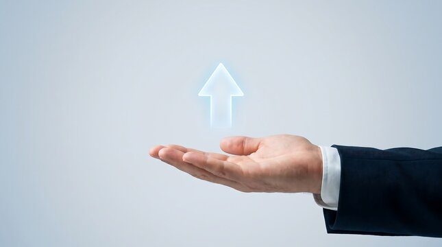 Businessman holding a digital growth arrow. Financial success and business progress concept.
