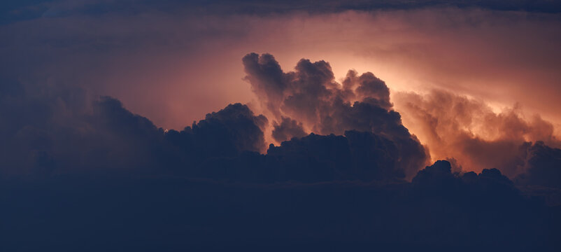 Lightning bolts in the cumulus clouds, powerful storm