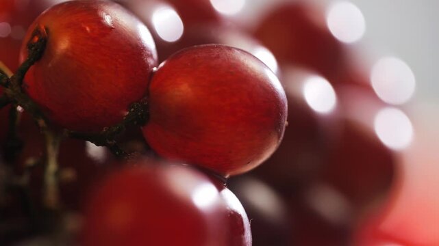 Red grape, spanish supermarket food, Close-up green grape cluster on vine in the vineyard. Stock Photo