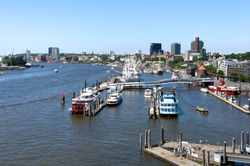 Fototapeta premium Elevated panoramic view of the Port of Hamburg and Landungsbruecken piers taken from the Elbphilharmonie plaza