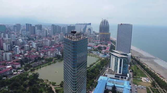 Azure Tower skyscraper and Ardagani Lake panorama in Batumi, Georgia
