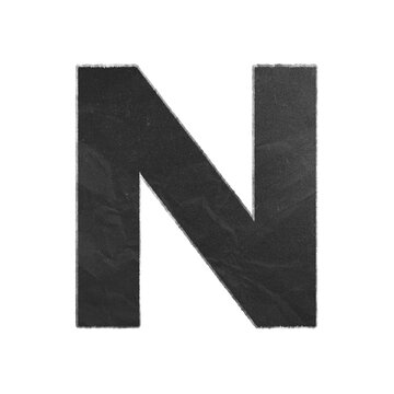 Uppercase letter N cutout from black textured paper with distressed white edges isolated on white background