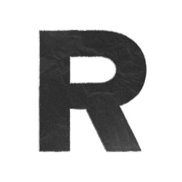 Uppercase letter R cutout from black textured paper with distressed white edges isolated on white background