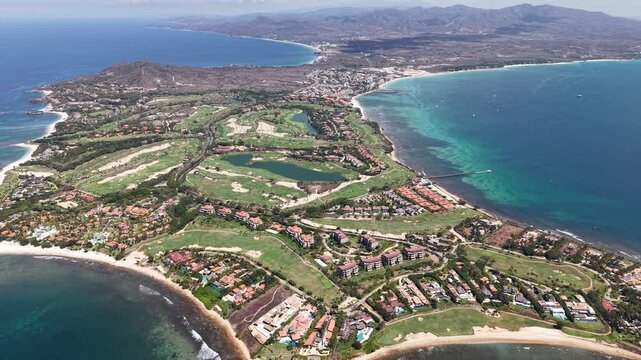Aerial drone approach towards the Punta de Mita peninsula coastline