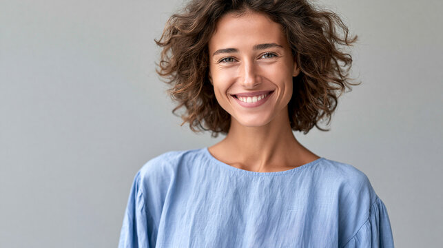 Smiling woman with curly hair on a transparent background, business portrait, corporate communication , with copy space