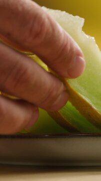 Melon close up, man cutting Watercolor of a whole melon and slice, summer juicy fruit