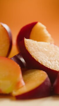 Fresh ripe apricots, peach and nectarine isolated on a white background. Colorful summer stone fruits with natural texture, healthy organic food, vegan nutrition, fresh harvest, juicy seasonal produce