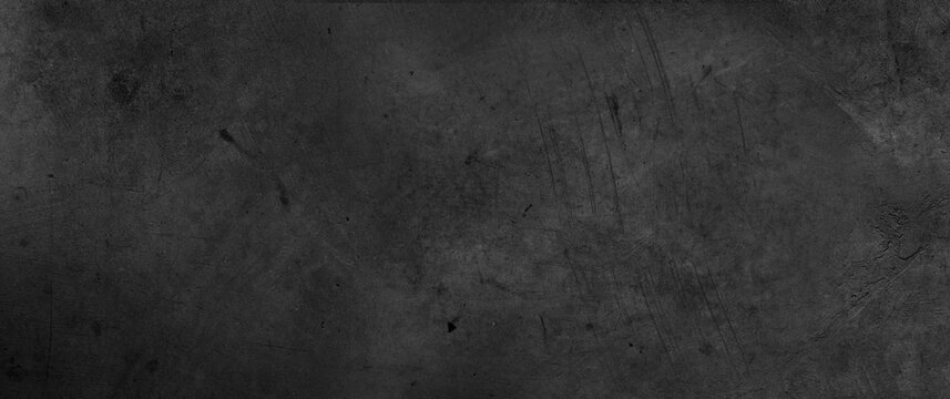 Dark grey textured concrete wall background