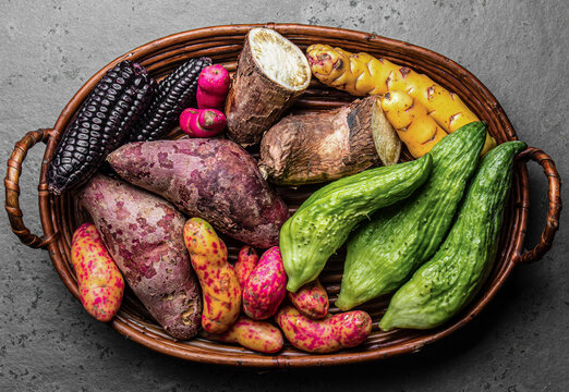 Fresh peruvian Latin American vegetables caigua, sweet potatoes, black corn, camote, yuca