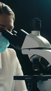 Engineer doctor working with microscope in laboratory, Scientific laboratory with various research equipment, man conducting experiments and research, Science and technology concept.