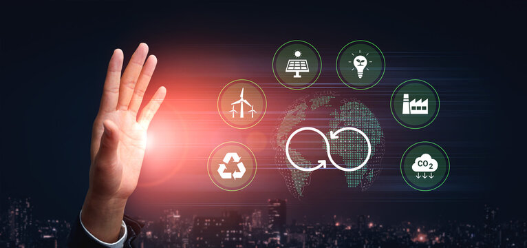 A hand gestures towards various icons representing sustainable technologies and renewable energy, highlighting innovation and commitment to environmental solutions in a modern setting. Cyphers