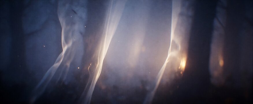 Cinematic volumetric light beams cutting through dark mist, futuristic atmospheric background for trailers and teasers
