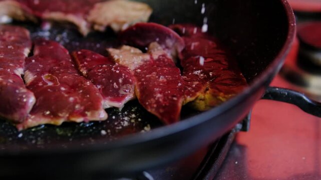 Complete step by step recipe for pan fried beef liver with onions and carrots, from slicing raw liver to frying, seasoning and serving homemade traditional meal