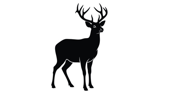 Silhouette of a majestic deer with large antlers standing in profile