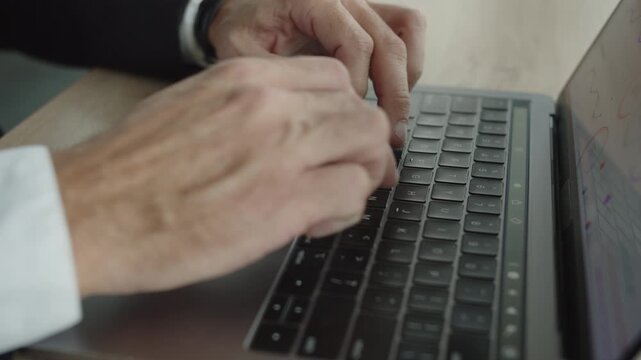 Man CEO check diagram online, closeup. Businessman work on laptop in office. Remote online working. Business success. Businessman using laptop in business office. Freelancer working online
