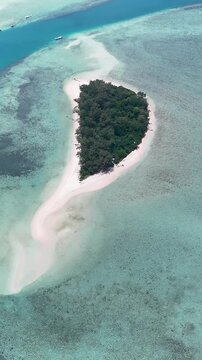 Aerial shot of Kerayaan Beccu Beach, a white-sand beach in Kotabaru, South Kalimantan