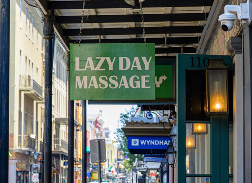 New Orleans, LA, USA - July 1, 2026: Lazy Day Massage Business on Royal Street in the French Quarter