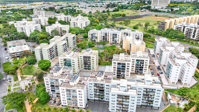 Aerial view of the Octogonal Sector neighborhood, notable for its octagonal-shaped residential buildings, planned green spaces and recreational areas, and proximity to City Park. Bras&iacute;lia, Brazil 2025