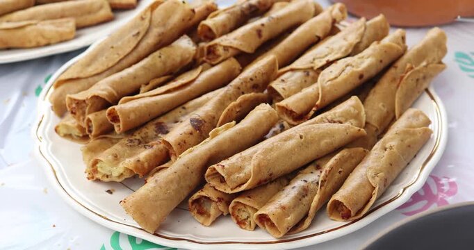 flautas de pollo or chicken fried tacos in Mexico Latin America, Mexican feast with Homemade food on table