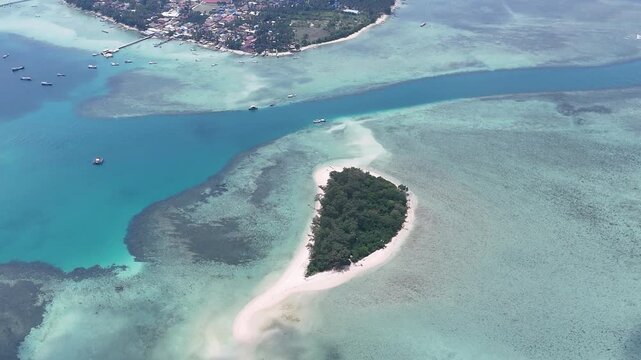 Aerial shot of Kerayaan Beccu Beach, a white-sand beach in Kotabaru, South Kalimantan