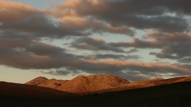 sunset light falling on mountain, Stanford, South Africa 