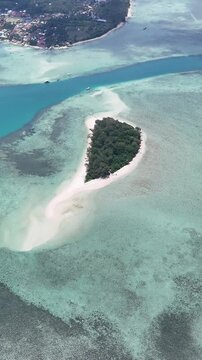 Aerial shot of Kerayaan Beccu Beach, a white-sand beach in Kotabaru, South Kalimantan