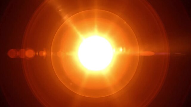 Close-up of glowing sun with intense light rays radiating outward against a dark space background.