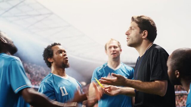Man referee raising yellow card as warning for angry player on stadium pitch, sanctioning rules violation and foul punishment due to heated conflict, match official decision, with match conflict.