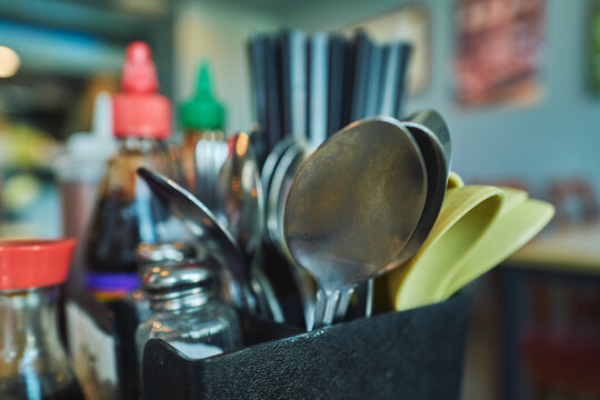 Condiment station at a casual restaurant counter